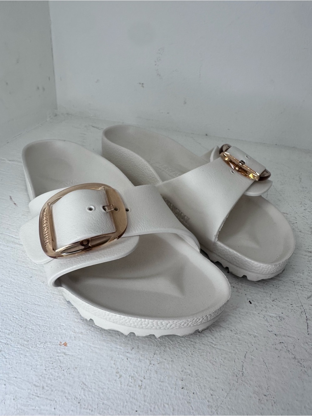 Birkenstock White Slide Sandals with Gold Buckle